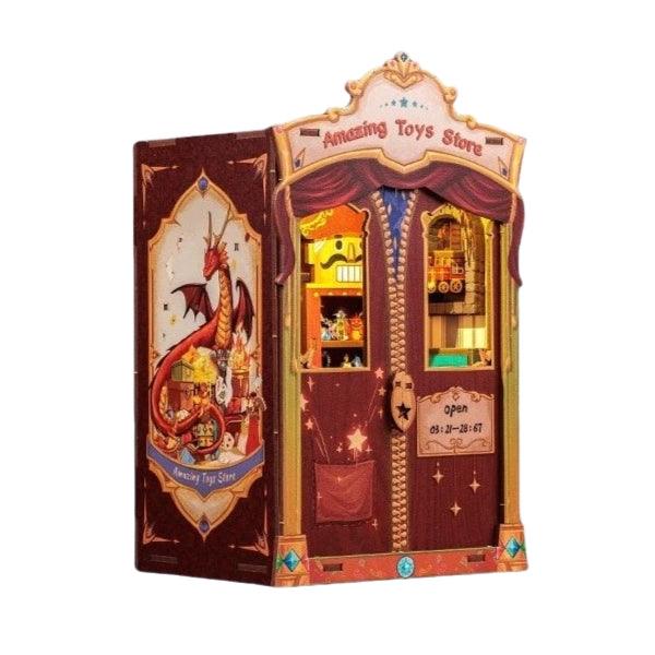 Amazing Toy Store DIY Book Nook Kit, a mini magic shop with toys and enchantment. Features easy 2-hour assembly, touch switch light, PVC dust cover, and more. Perfect for those who love the whimsical world, DIY enthusiasts, book lovers, bookend lovers, model building lovers, dollhouse collectors, bookshelf insert decor.