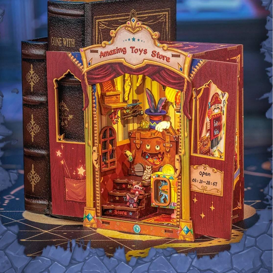 Amazing Toy Store DIY Book Nook Kit, a mini magic shop with toys and enchantment. Features easy 2-hour assembly, touch switch light, PVC dust cover, and more. Perfect for those who love the whimsical world, DIY enthusiasts, book lovers, bookend lovers, model building lovers, dollhouse collectors, bookshelf insert decor.