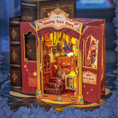 Amazing Toy Store DIY Book Nook Kit, a mini magic shop with toys and enchantment. Features easy 2-hour assembly, touch switch light, PVC dust cover, and more. Perfect for those who love the whimsical world, DIY enthusiasts, book lovers, bookend lovers, model building lovers, dollhouse collectors, bookshelf insert decor.