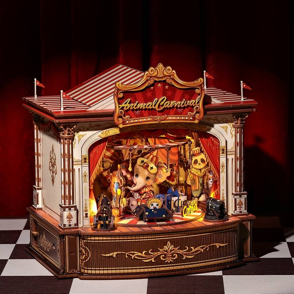 Miniature house model of a circus tent with animated animal figures