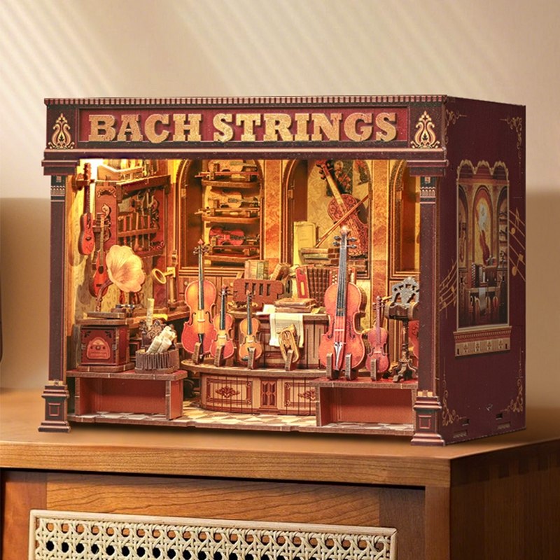 wooden miniature house Model of a music store with 'Bach Strings' branding