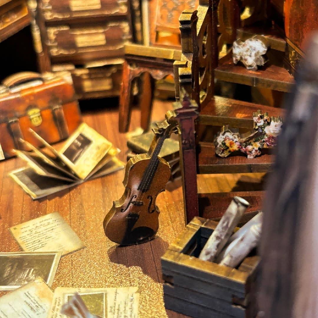 image displaying the miniature detective essentials of the finished Bell's Mystery DIY Book Nook, which is Inspired by Detective Scene in Holmes Sherlock for Bookshelf Decor