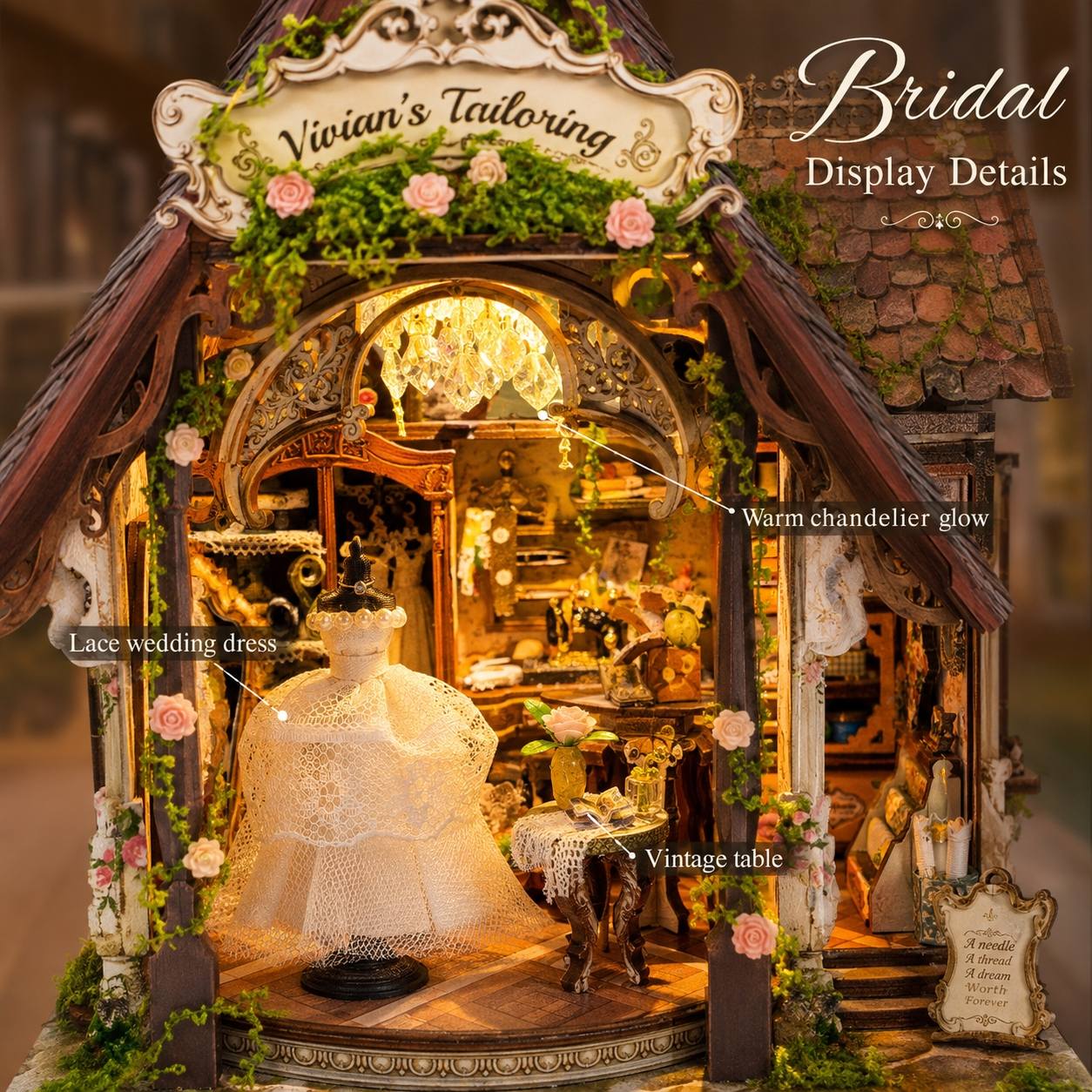 A highly detailed miniature display shop set under a sign reading 'Vivian's Tailoring' and 'Bridal Display Details,' featuring a lace wedding dress mannequin, warm chandelier glow, vintage table, floral decorations, and intricate carved woodwork.