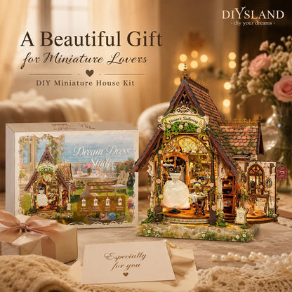 DIY miniature house kit displayed with its retail box and assembled model. The miniature house features a warm glowing shop interior, detailed roof, and decorative garden base.
