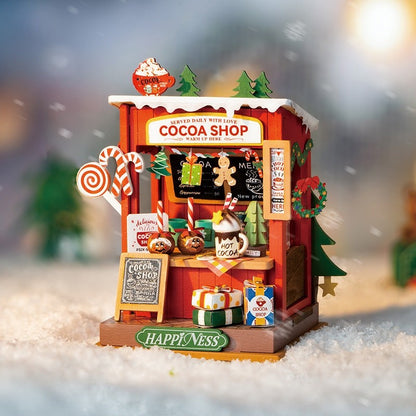 image displaying the assembled Christmas Cocoa Shop DIY Miniature House Kit in festive table setting