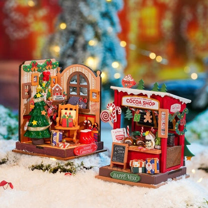 the assembled Christmas Cocoa Shop DIY Miniature House Kit in festive table setting