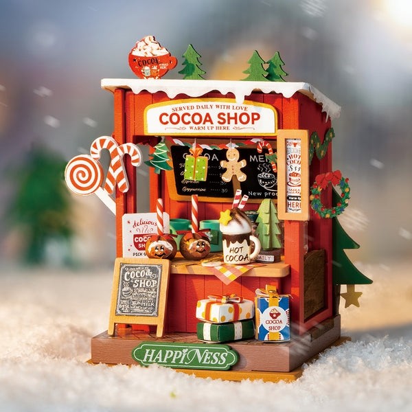 image displaying the assembled Christmas Cocoa Shop DIY Miniature House Kit in a festive table setting