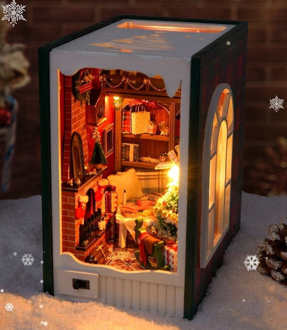 finished Christmas Diary DIY Book Nook Kit beautifully displayed in a snowy setting