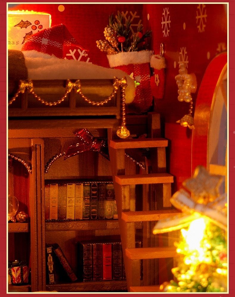 miniature stairs and bedroom in the finished Christmas Diary DIY Book Nook Kit