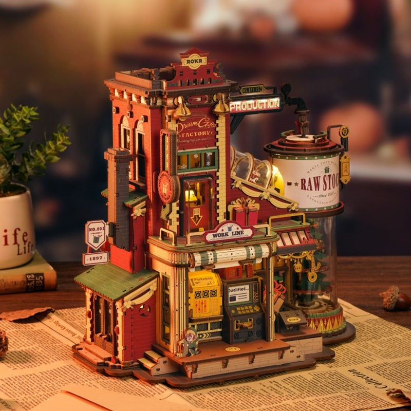 image displaying the finished Christmas Dream Gift Factory DIY Miniature House Music Box on table