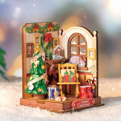 image displaying the assembled Christmas Fireplace DIY Miniature House Kit in festive themed table setting