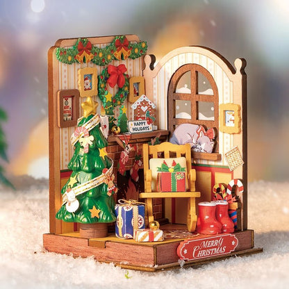 image displaying the assembled Christmas Fireplace DIY Miniature House Kit in festive themed table setting