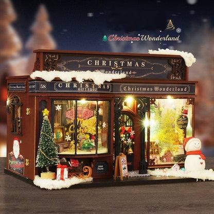 image displaying the left side view of finished Christmas Gift Shop DIY Miniature House Kit in Christmas themed table setting