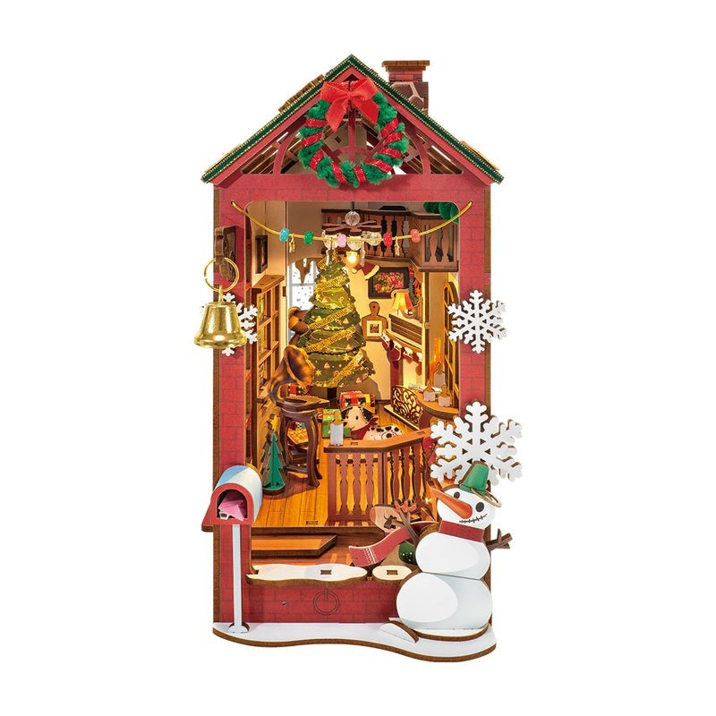 image displaying a finished Christmas House DIY Book Nook Kit in white background