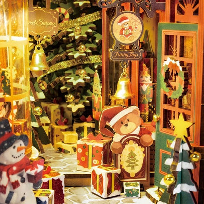 image displaying miniature scenes of the finished Christmas Street DIY Book Nook Kit