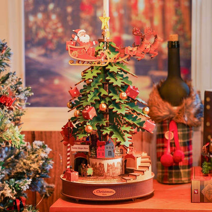 Christmas Melody Tree 3D Wooden Puzzle with warm light in a Christmas-themed table setting