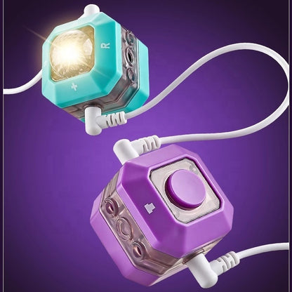 Two colorful electronic building blocks with lights and buttons on a purple background