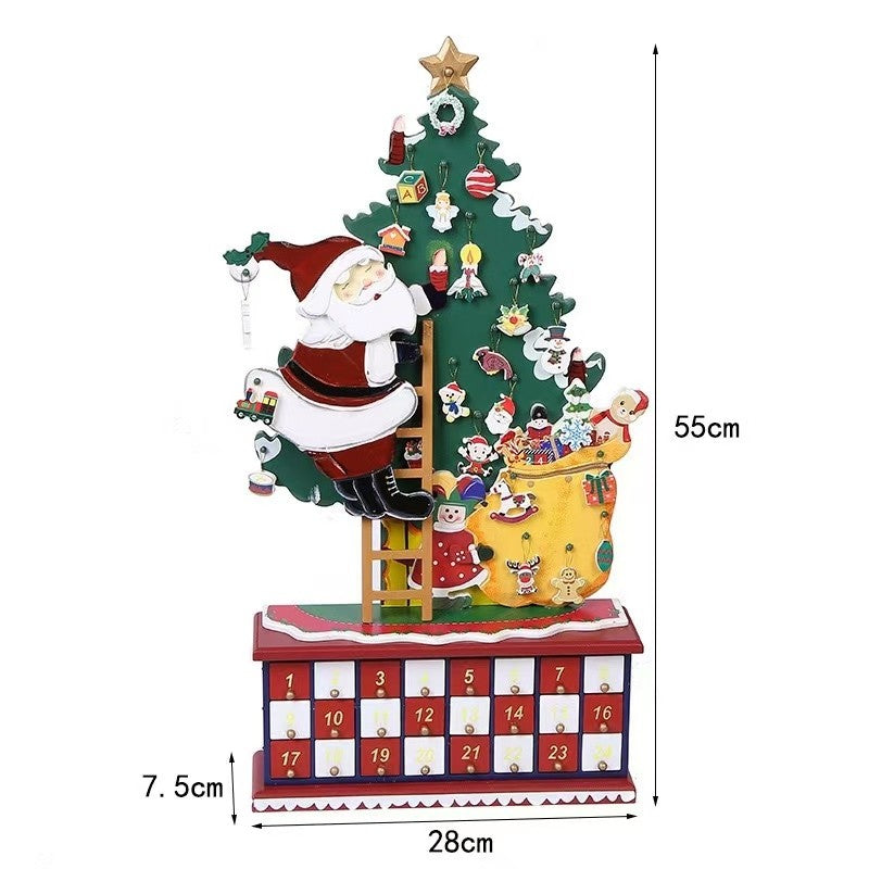 Christmas Countdown Wooden Advent Calendar featuring Santa climbing up a ladder alongside a decorated Christmas tree, 24 drawers on the base