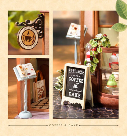 Miniature coffee shop setup with signs and decor elements.