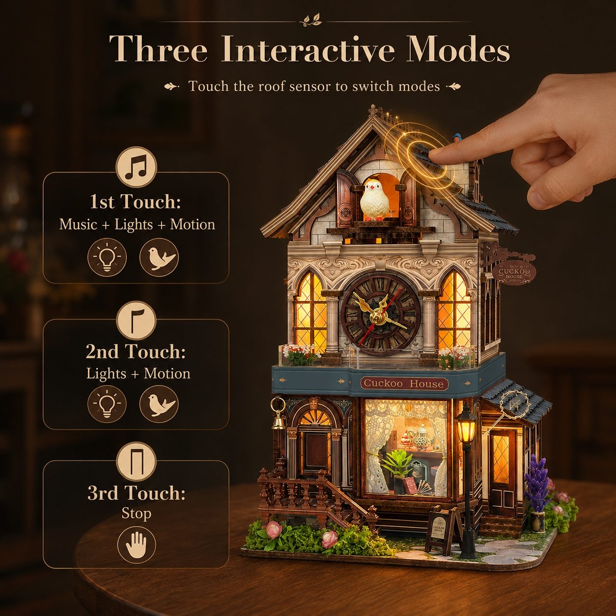 A decorative miniature house night light with warm glowing windows and a clock face, shown on a wooden surface with a human hand touching the roof sensor. Text at the top reads 'Three Interactive Modes' and side panels explain touch-based music, lights, motion, and stop functions.