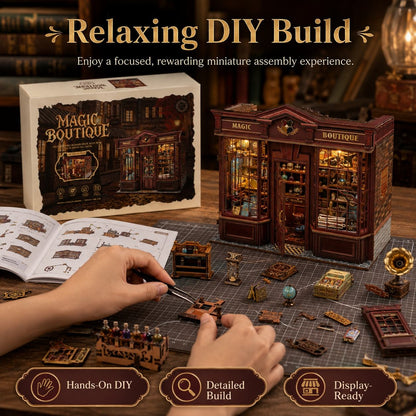A miniature DIY assembly kit for a fantasy boutique, shown with its box, open instruction manual, and hands assembling the detailed wooden model on a cutting mat. The scene is warmly lit with cozy background elements.