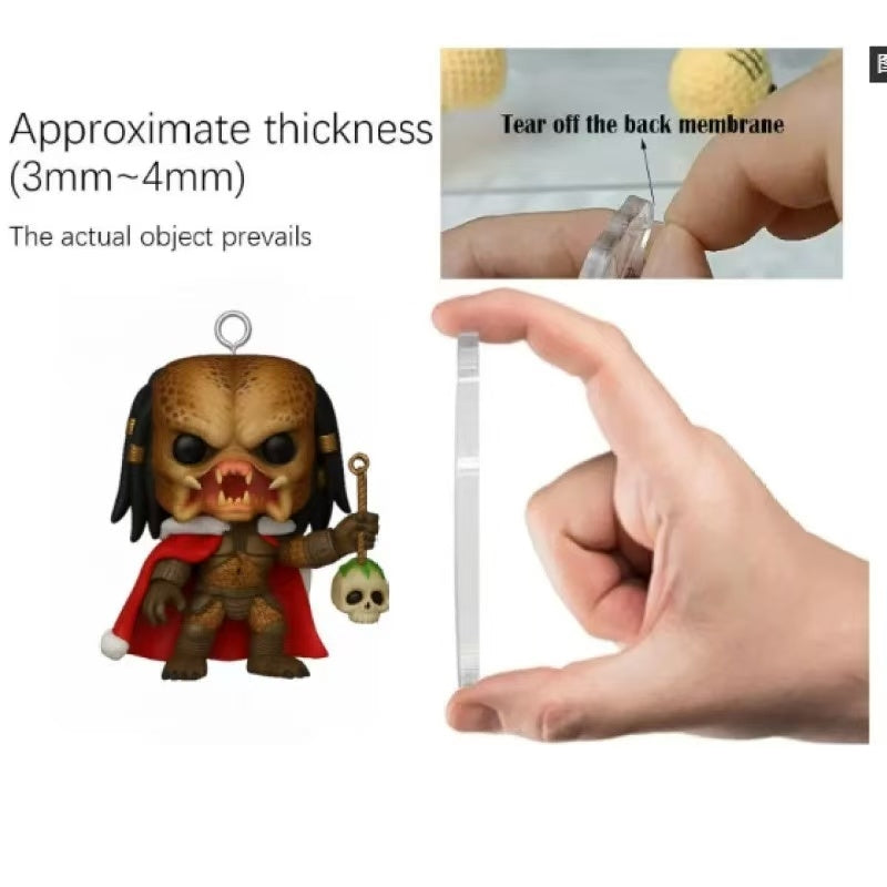 Hand holding a acrylic piece next to a small figurine, with text about thickness.