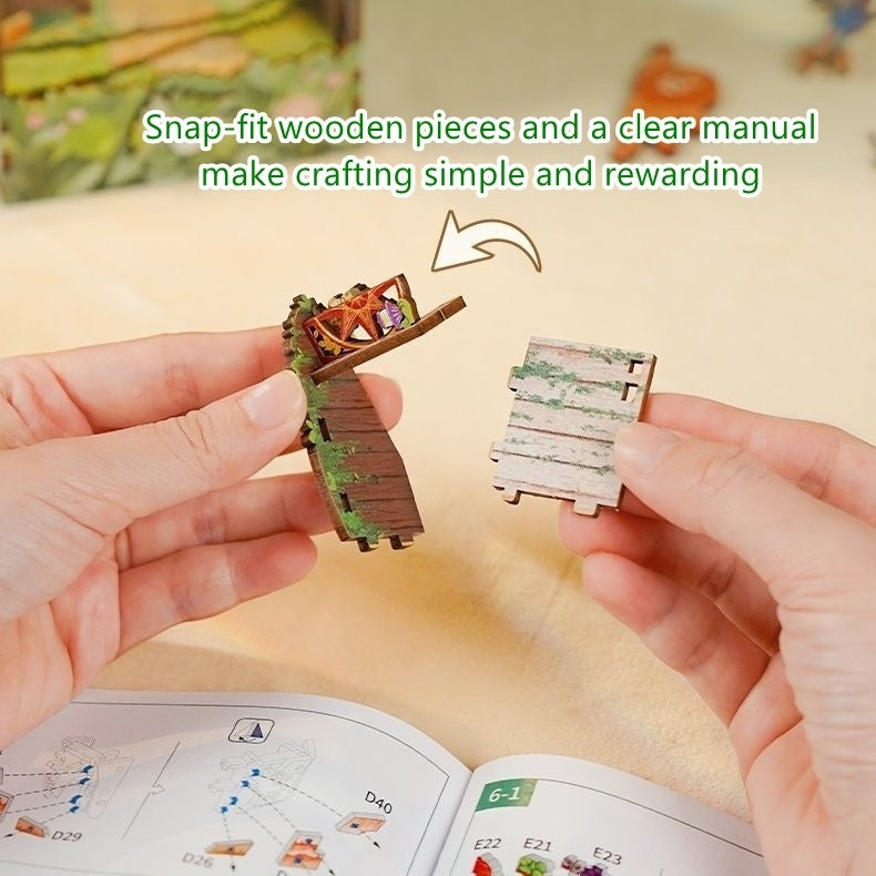 Two hands holding small wooden pieces with text about snap-fit design and clear manual.