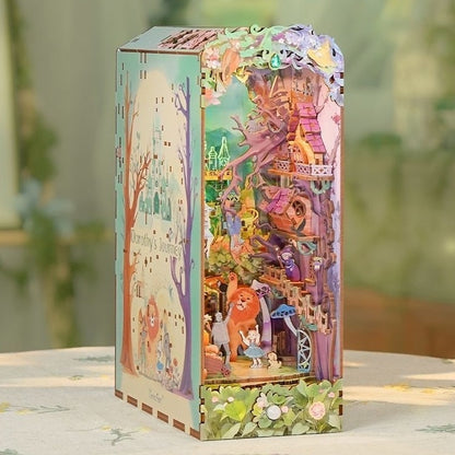 Decorative wooden book nook with colorful decoration of the fairy tale the Wizard of Oz scenes on a light surface.