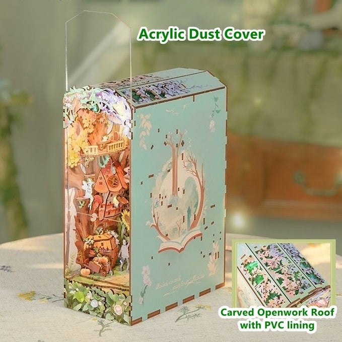 Acrylic dust cover with carved openwork roof and PVC lining of Dorothy's Journey Book Nook on a light surface.