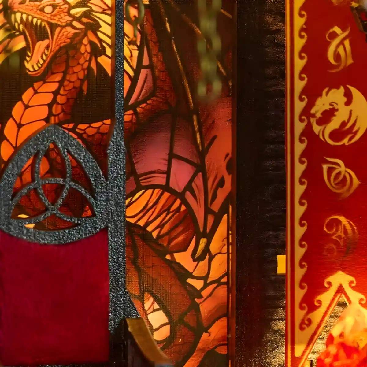 Decorative item with dragon design and red banners in Gothic-style dragon tower miniature house