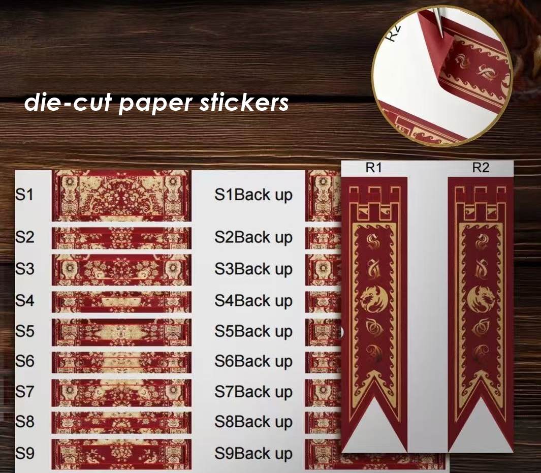 Set of die-cut paper stickers with decorative designs on a wooden surface.