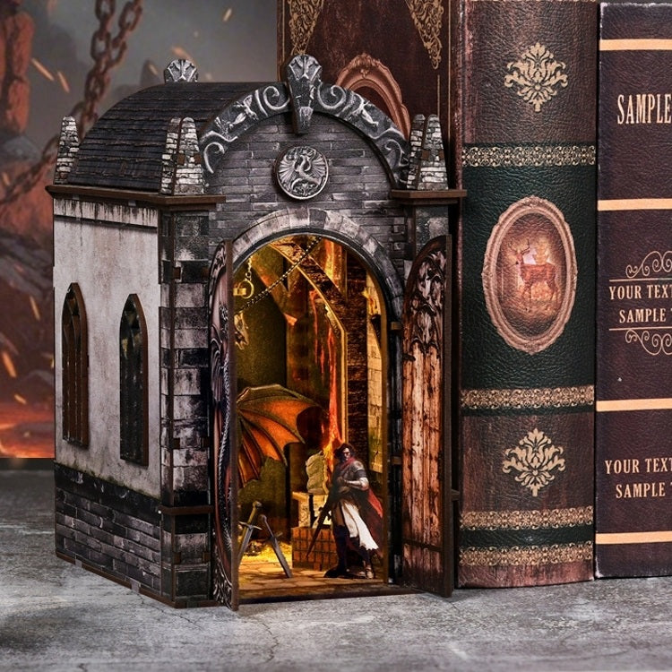 Decorative book nook with a miniature mysterious realm scene inside, resembling a castle or mansion.