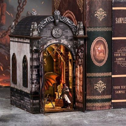 Decorative book nook with a miniature mysterious realm scene inside, resembling a castle or mansion.