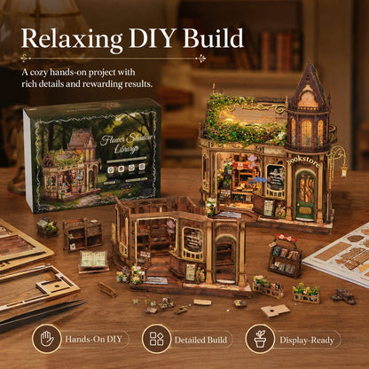 DIY wooden model kit of a cozy bookstore and cafe, shown with its packaging box, assembled model, and various construction pieces on a wooden table. The image features promotional text overlays highlighting the hands-on DIY nature of the project.