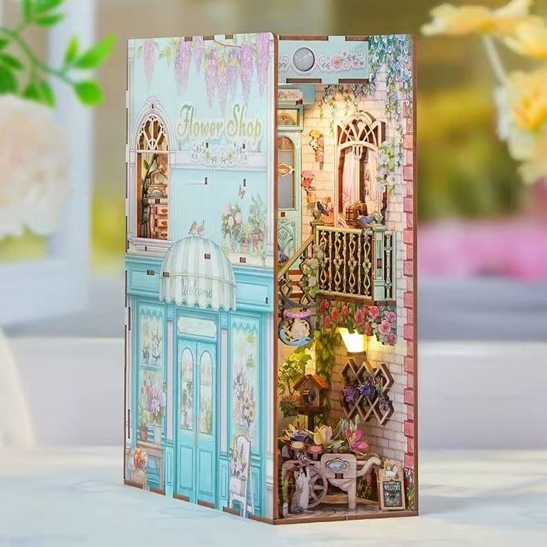diorama Model of a flower shop with intricate details in a book nook box