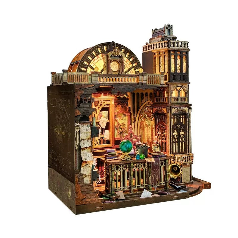 cozy miniature house of a gothic-style building with intricate design and lighting effects on a white background.