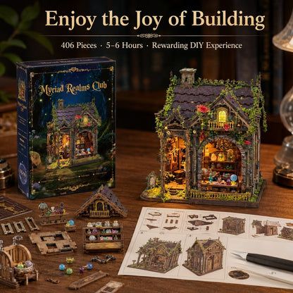 A DIY wooden house building kit displayed on a wooden table, showing the assembled miniature house, its illustrated box, scattered loose pieces, and an instruction sheet. Text at the top reads 'Enjoy the Joy of Building' with '406 Pieces • 5-6 Hours • Rewarding DIY Experience.