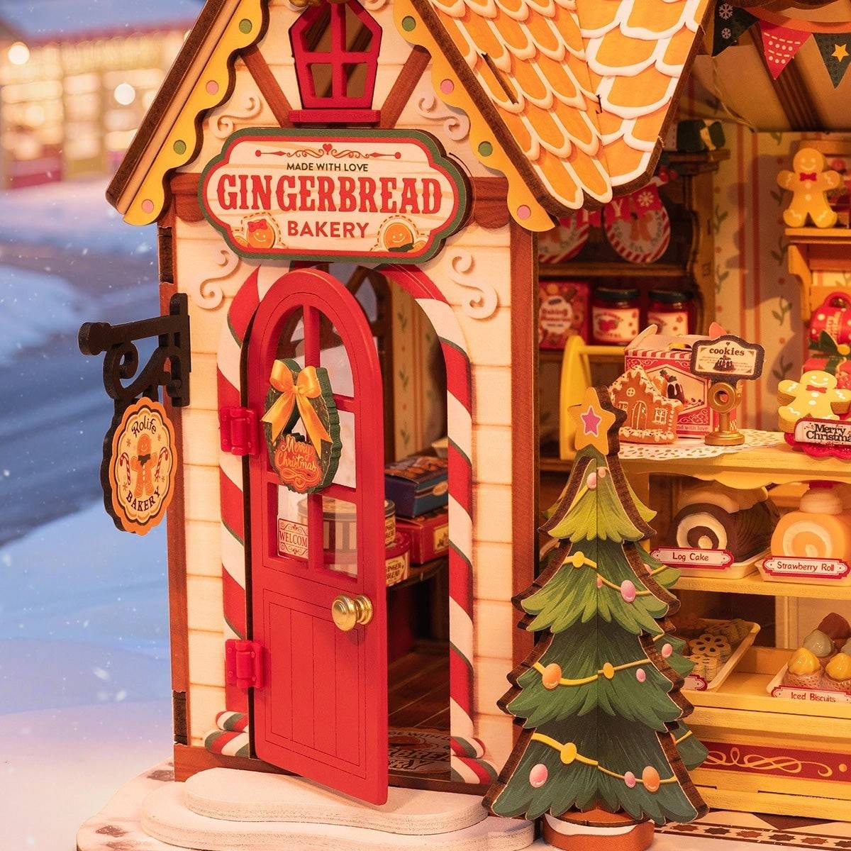 Gingerbread bakery miniature house with a Christmas tree and snowy background