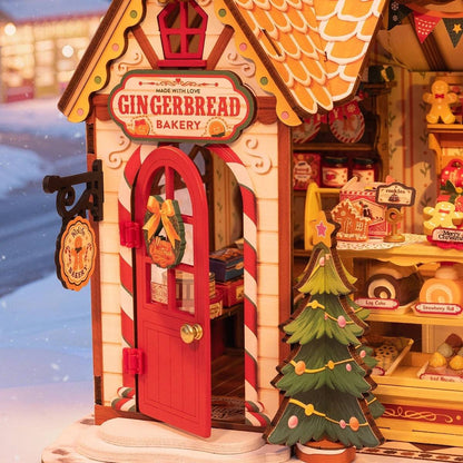 Gingerbread bakery miniature house with a Christmas tree and snowy background