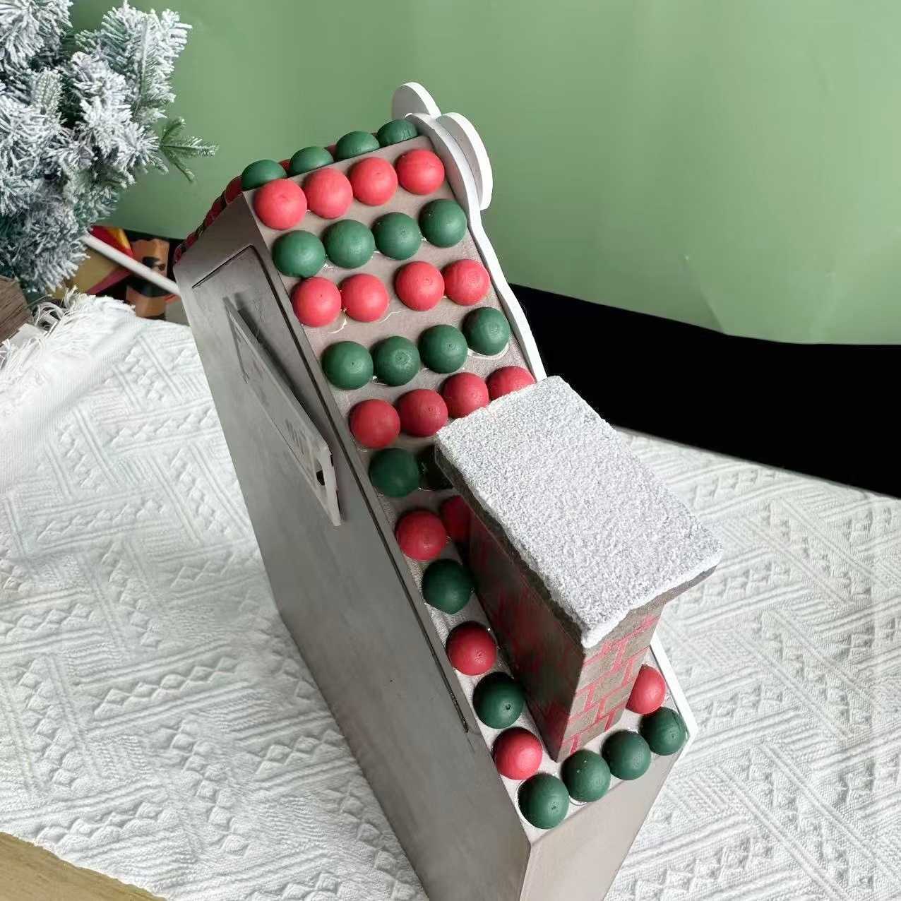 close-up of the chimney of Gingerbread House Wooden Advent Calendar