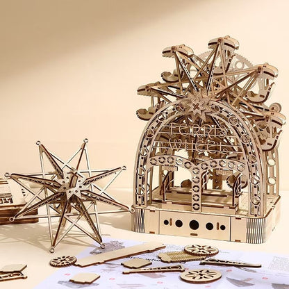 image display jigsaw puzzles and an assembled Hand Cranked Ferris Wheel 3D Wooden Puzzle on table