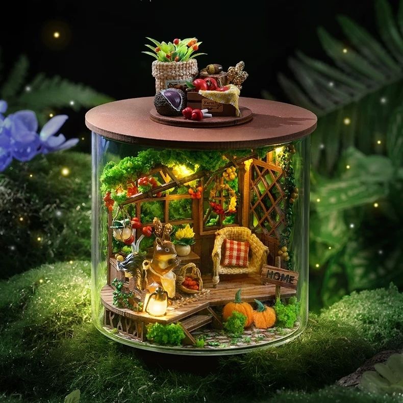 image displaying an finished the Harvest Festival DIY Miniature House Kit in a magical forest themed   setting