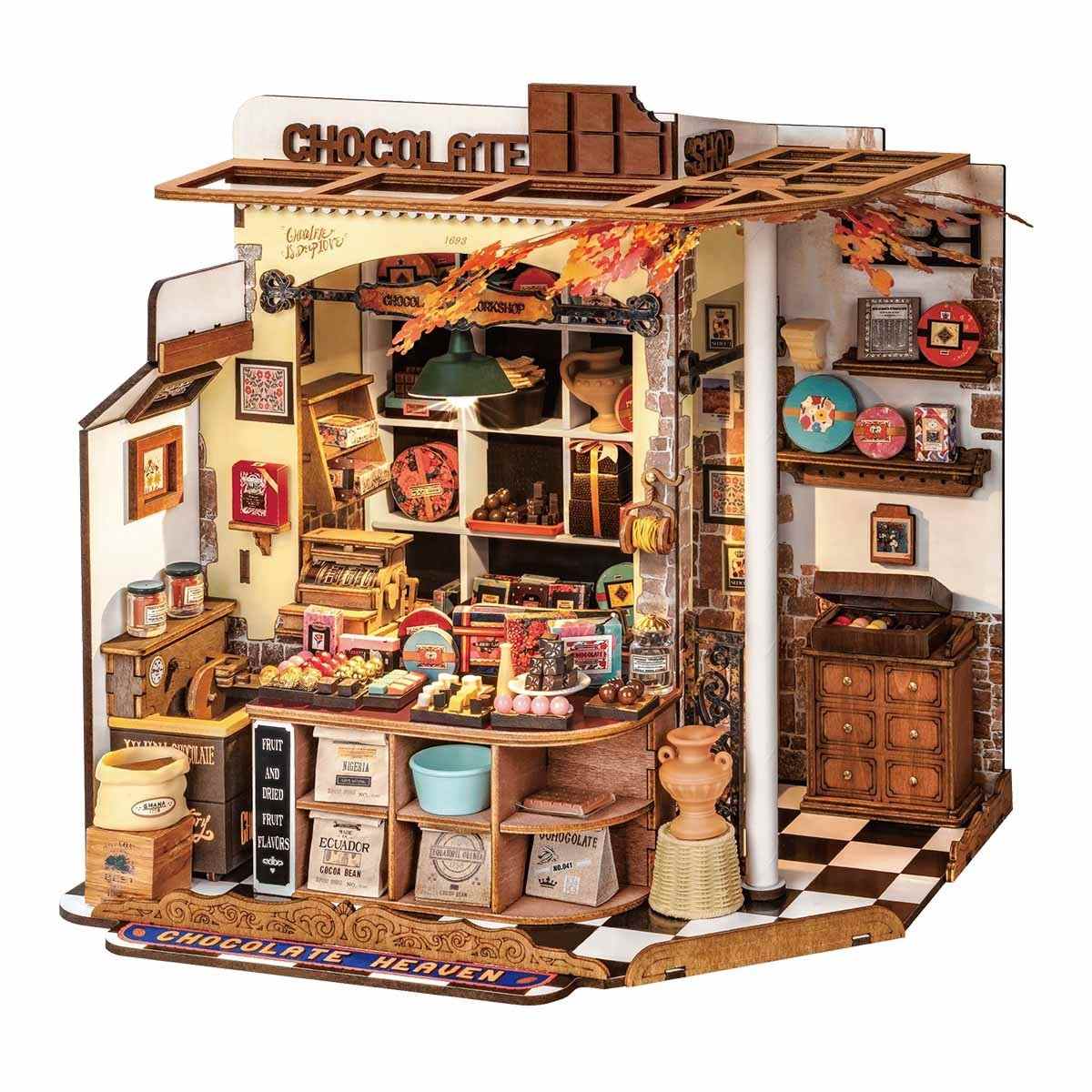 Detailed model of a chocolate shop with various products and decor.