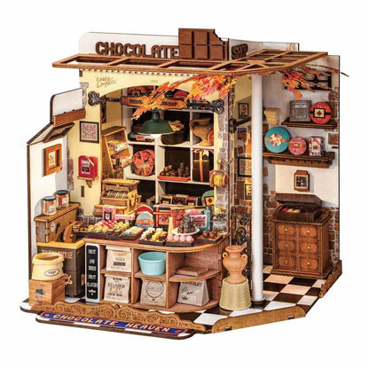 Detailed model of a chocolate shop with various products and decor.