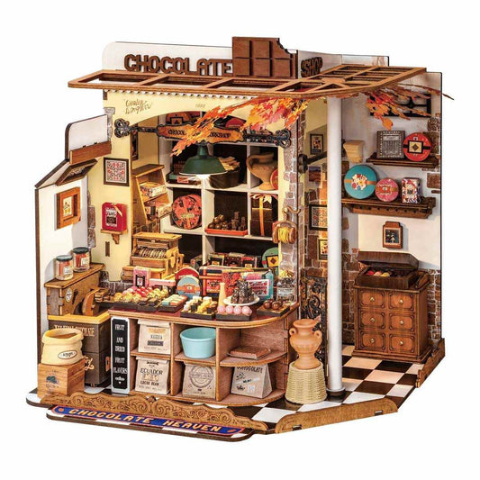 Detailed model of a chocolate shop with various products and decor.