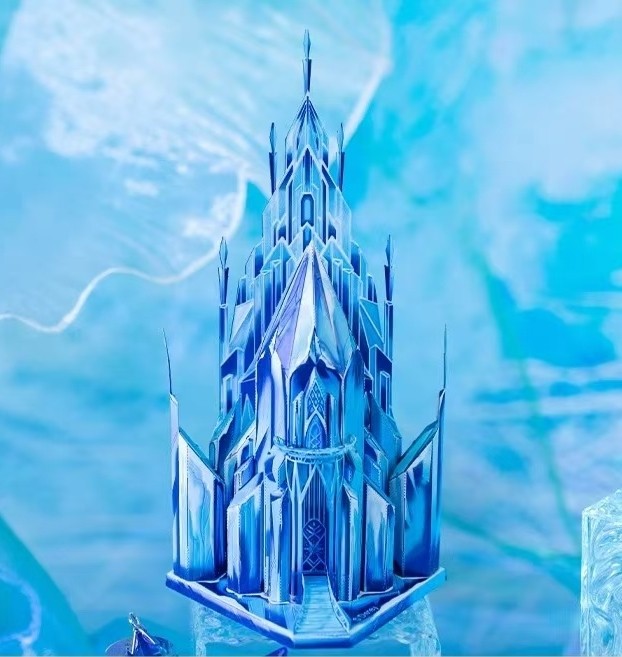 image displaying the finished Ice Castle 3D Metal Puzzle model in a ice and snow table setting