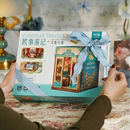 image showcasing package of Infinity Train Cabin DIY Book Nook Kit
