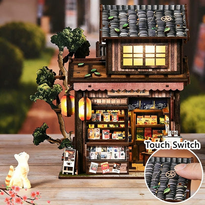 Miniature woodenJapanese grocery store with illuminated interior, shelves, and a touch switch feature.