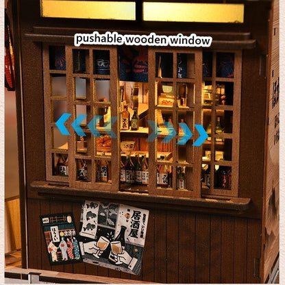 miniature Wooden window display with various bottles and posters inside a Japanese Izakaya store.