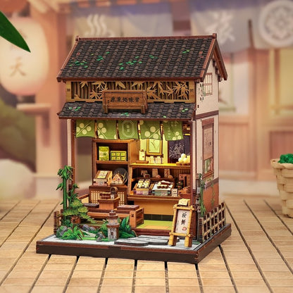 Detailed wooden miniature house of a traditional Japanese tea house on a wooden floor